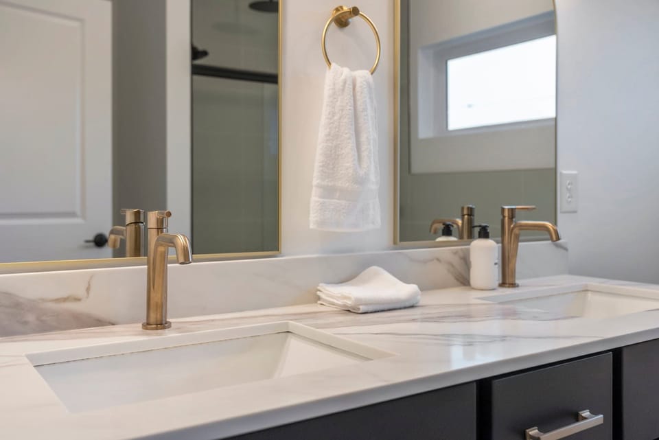 Marble countertop with brass fixtures