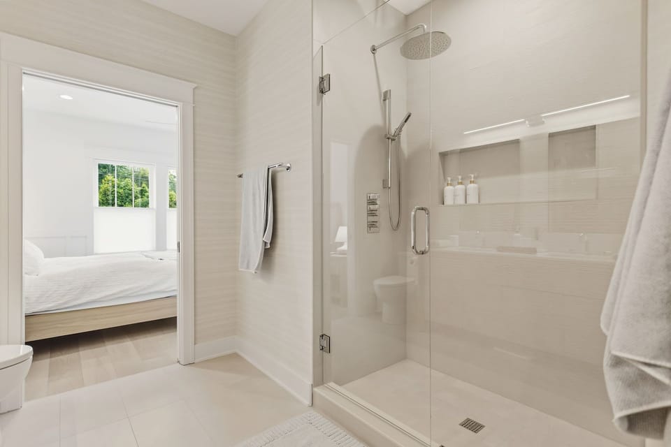 Full bathroom with walk-in shower and access from the master bedroom and living area