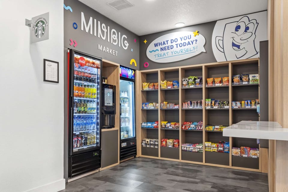 Snack shop with cold drinks and quick bites on shelves