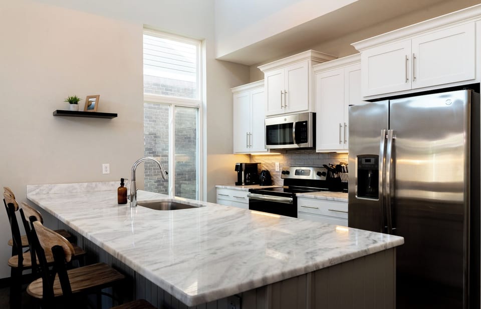Look at all that wonderful prep space waiting for your inner chef. Gathering around this gorgeous island will definitely be the highlight of your mornings.