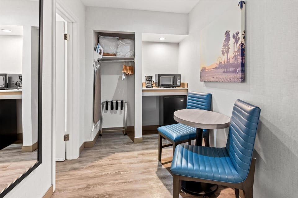 Standard Room, 2 Queen Beds, Refrigerator & Microwave, Courtyard Area | Pillowtop beds, desk, laptop workspace, blackout drapes
