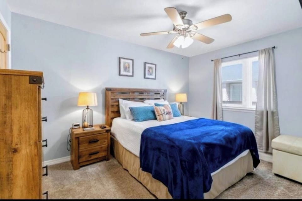 Primary bedroom. Spacious and open. 55" TV on the wall!