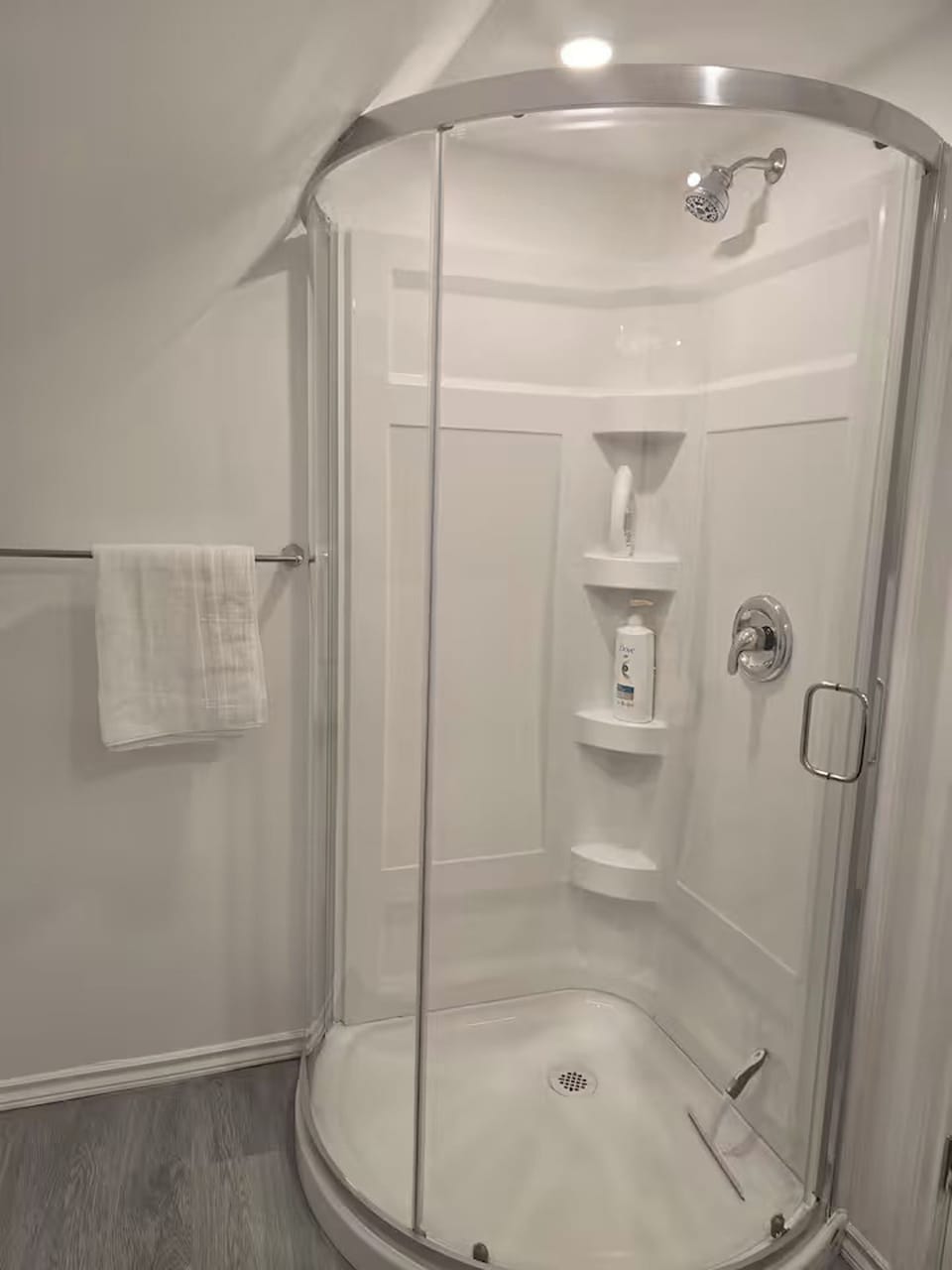 Stand-up shower with the necessities.
