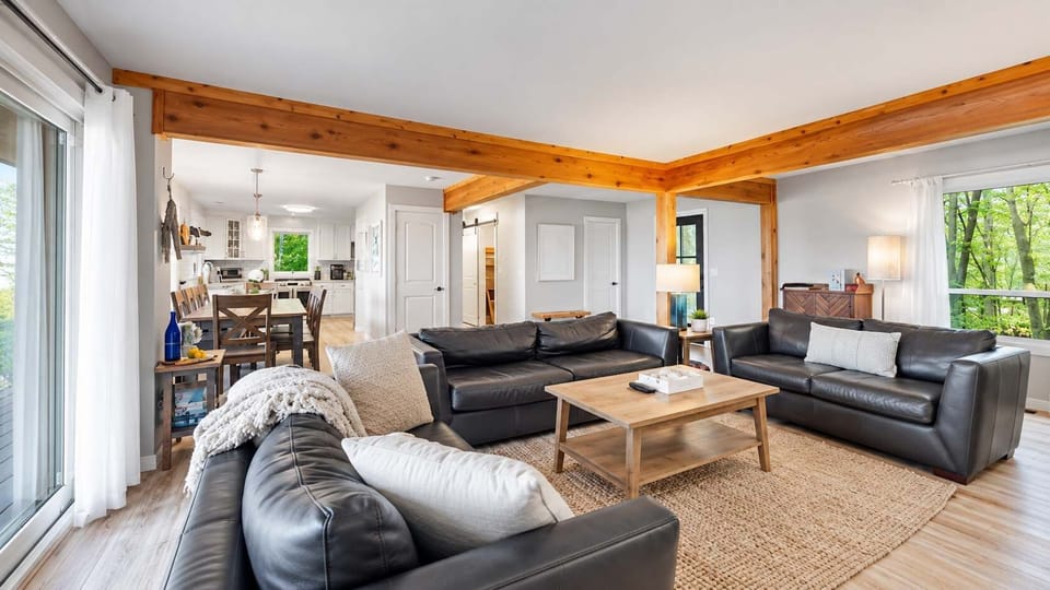 Open living area with spacious seating and lake views