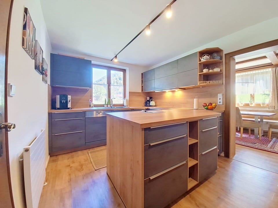 Flooring, Interior Design, Countertop, Furniture, Wood, Kitchen, Ceiling, Floor, Cabinetry, Wood Flooring