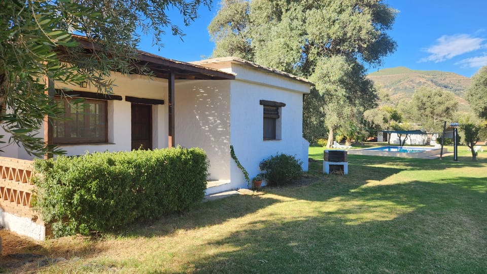 A small house nestled among centuries-old olive trees with spectacular views Cottage in La Alpujarra