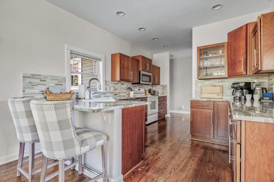 Pull up a seat at the kitchen island for breakfast or conversation.