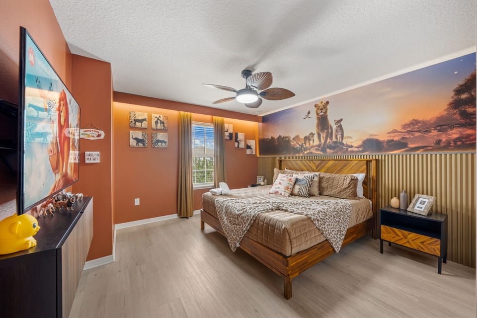 This isn’t simply a bedroom—it’s your front-row seat to the African savanna. A grand bed, glowing sunset mural and dramatic Lion King styling make every morning feel worthy of royalty.