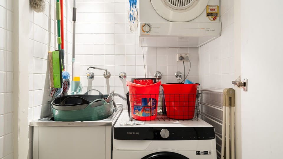 Compact laundry area for easy washing.