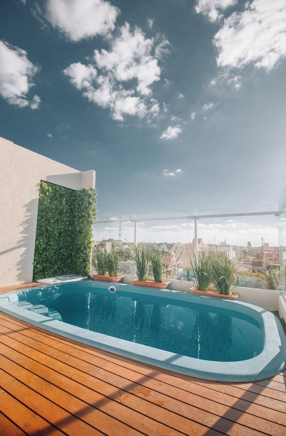 The pool has a whirlpool and panoramic views of Asunción