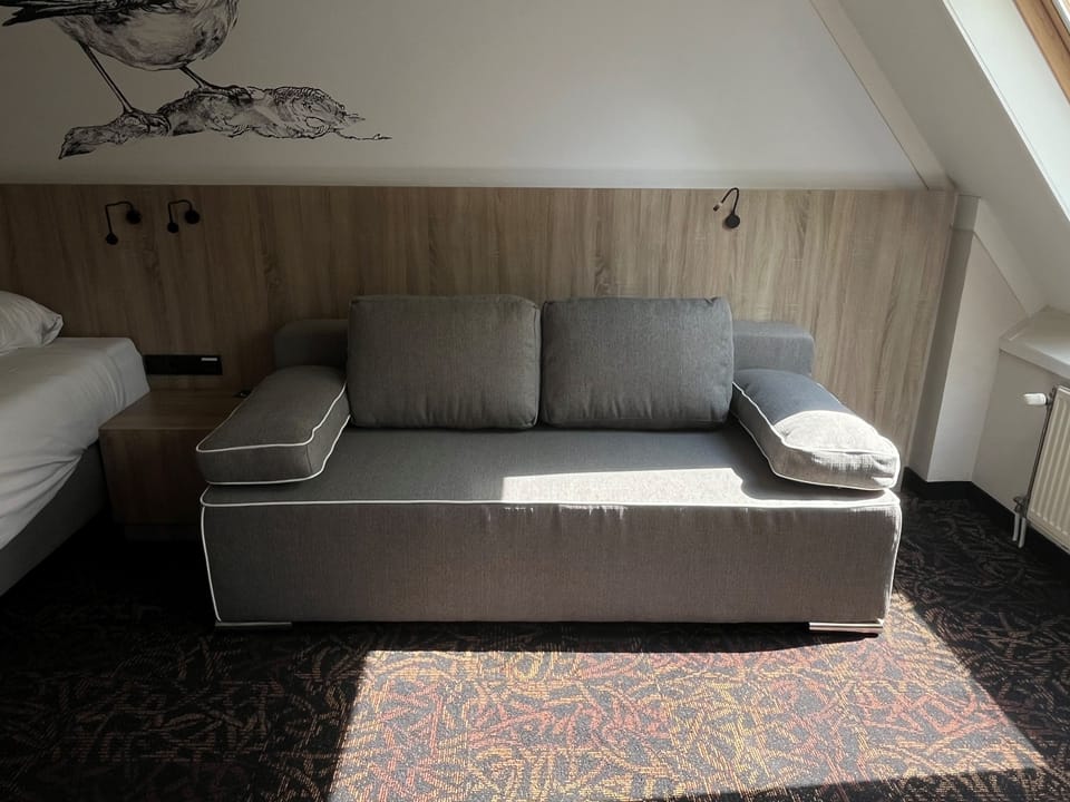 Unwind on the cozy sofa after a sunlit day away