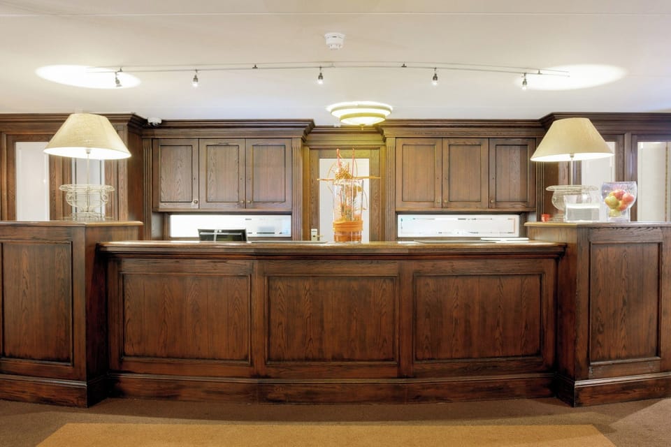 Arrive effortlessly at the polished reception for a smooth welcome.