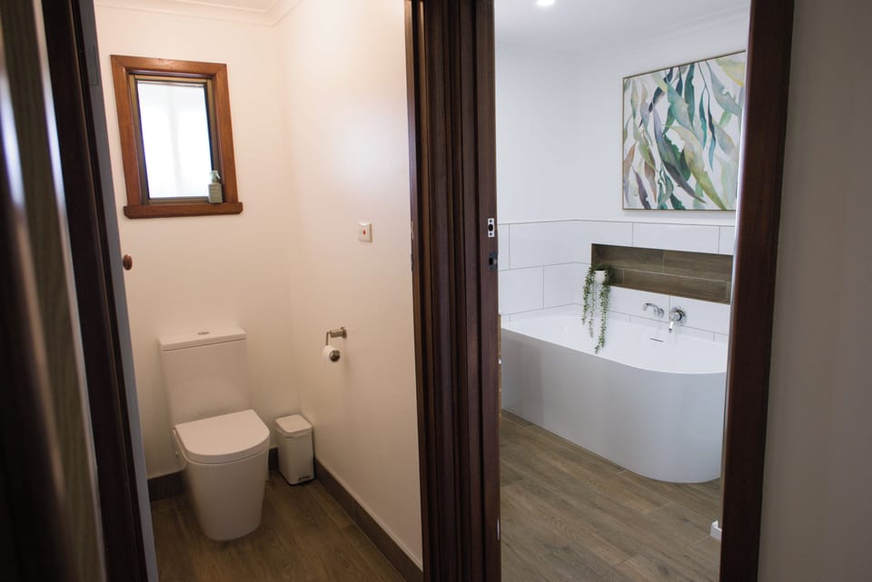 Modern bathroom with separate WC