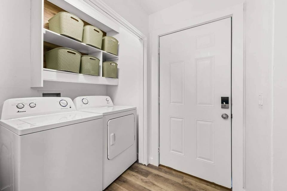Pack lighter with complimentary use of Unit B's in-home washer and dryer, conveniently located downstairs near the kitchen. Unit A also has its own laundry, so guests staying across both homes can wash clothing without sharing one laundry area