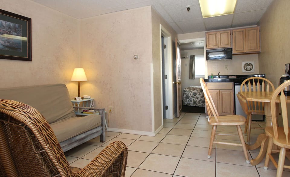Room, 1 Bedroom, Kitchenette, Second Floor | Living area | Flat-screen TV, DVD player