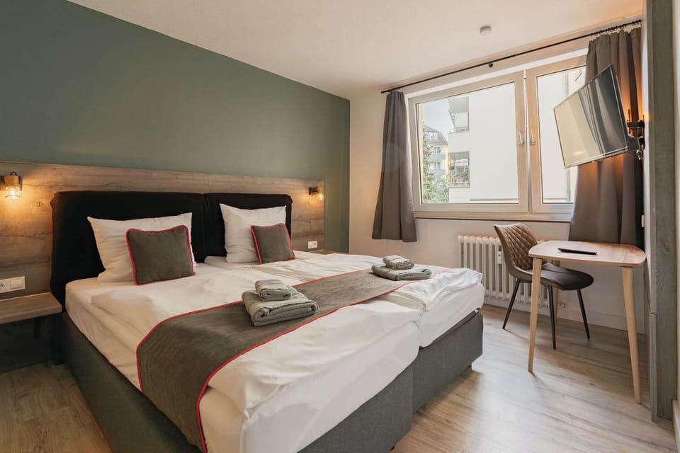Twin Room | Desk, laptop workspace, free WiFi, bed sheets