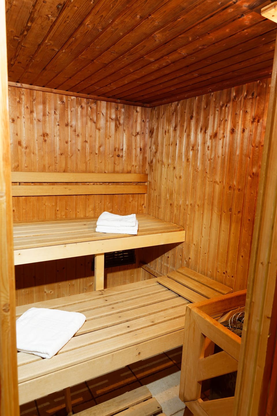 The wooden sauna invites a slow unwind after a day on the pistes.