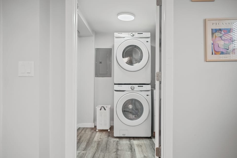 Laundry made easy — a full-size washer and dryer tucked neatly out of the way.
