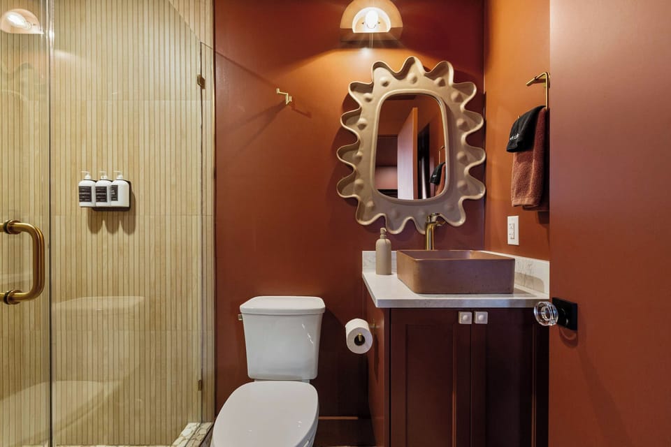 The private ensuite bathroom adds comfort and convenience