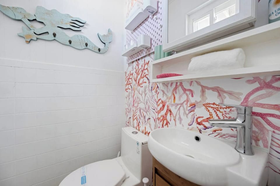 Half bathroom includes soap and 100 % cotton towels. 