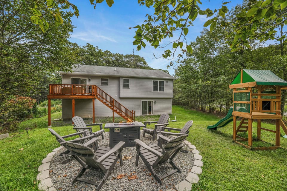Gather around the fire pit for stories under the stars. A private backyard with plenty of space for kids to play too.