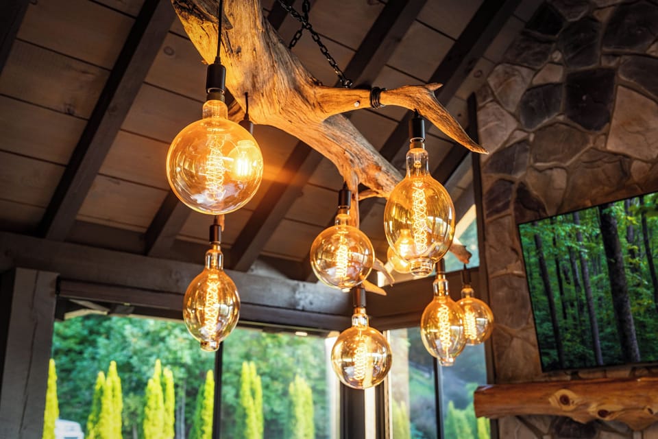 A little whimsical, a little rustic, and beautifully connected to nature. This wood chandelier brings the forest indoors, and makes outdoor dining feel even more magical.