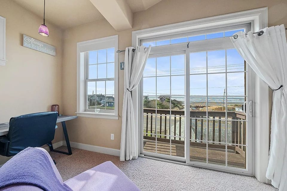 Master Bedroom Balcony – Ocean View — Peaceful retreat for morning coffee or sunset relaxation overlooking the Pacific.