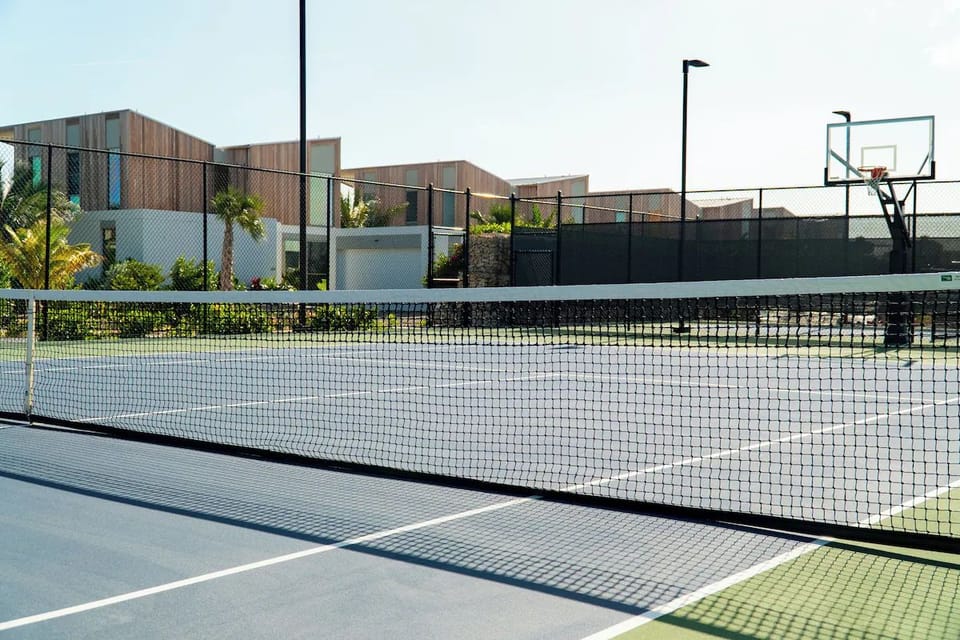 Serve, volley, and shoot hoops on pristine resort courts.