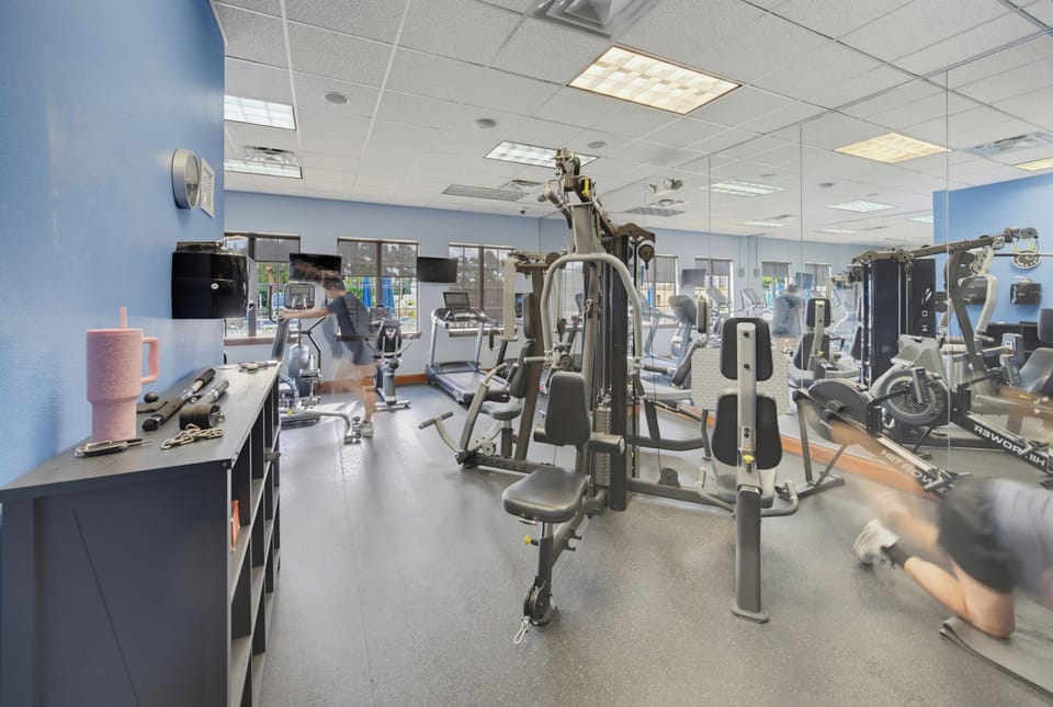 Stay active during your stay with access to our fully equipped fitness center, featuring a multi-station weight machine, cardio equipment, and free weights.