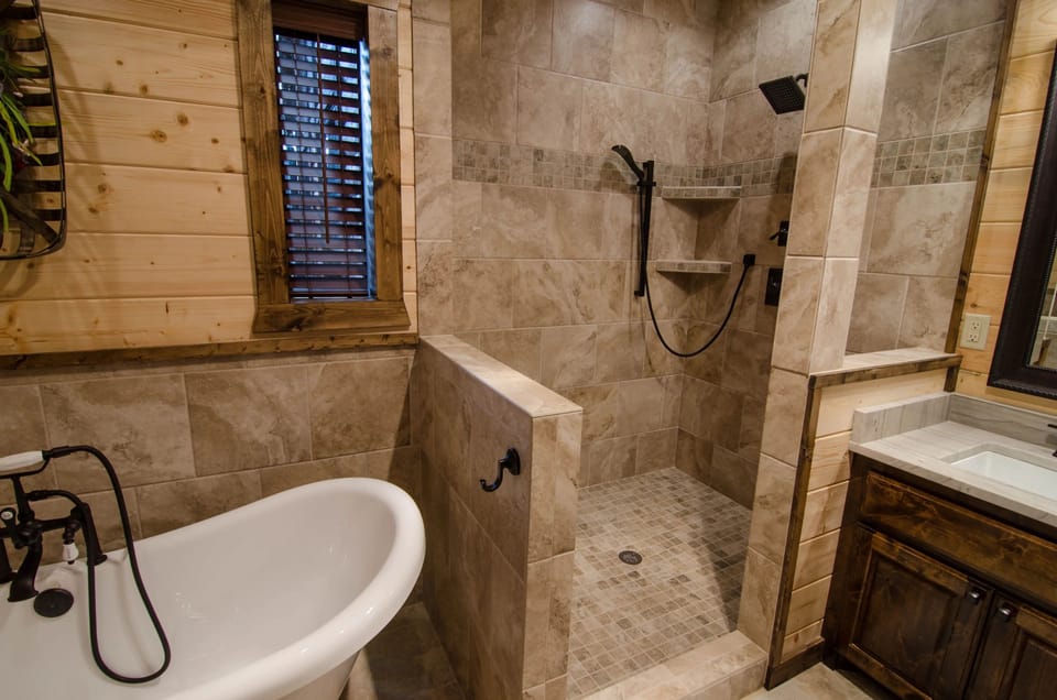 Spa-style bathroom with soaking tub and spacious walk-in tile shower