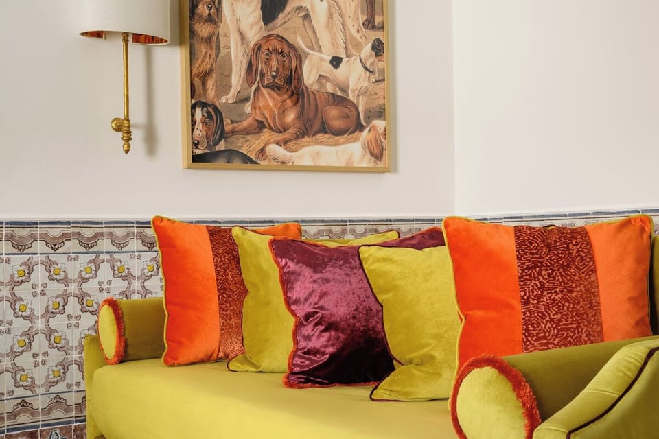 Step into a vibrant and inviting living space! With plush seating, bold colors, and elegant decor, this room is perfect for relaxing or entertaining. Natural light fills the space, creating a warm and cozy ambiance. 