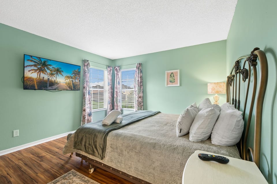 This inviting king bedroom offers a Smart TV and plenty of space to settle in comfortably.
