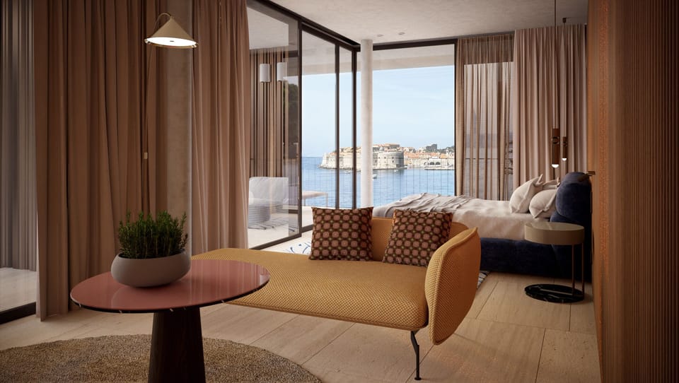 Deluxe Suite | Minibar, in-room safe, desk, blackout drapes