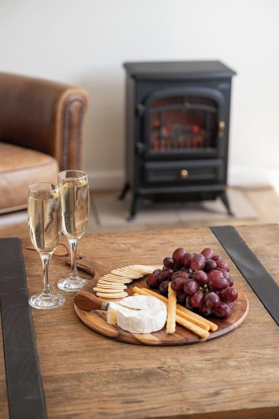 Settle in with a drink and nibbles in the cosy living area