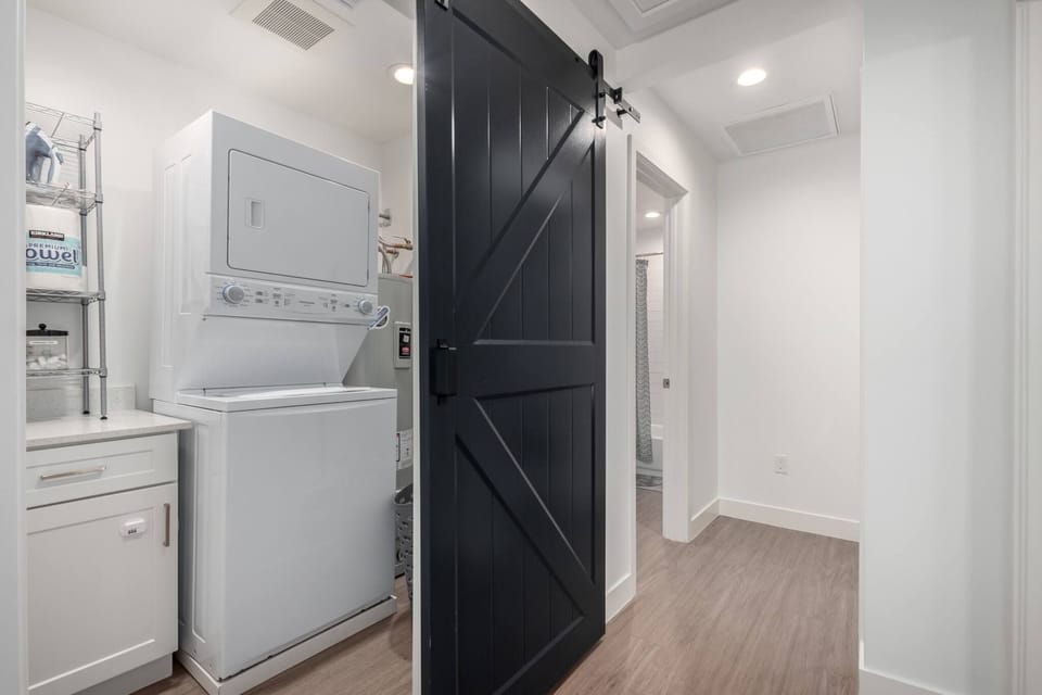 In-unit washer and dryer, fully stocked for the convenience of longer stays.
