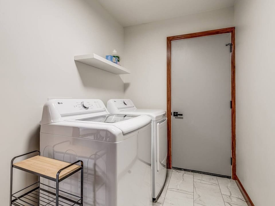 Laundry room with washer and dryer