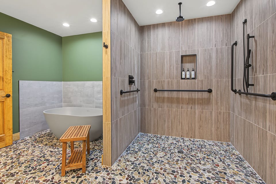 The primary bath has a wheelchair accessible shower.