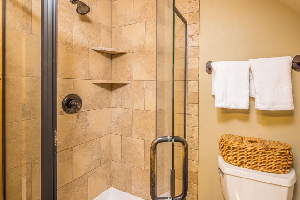 Walk-in shower in the second ensuite bathroom | Upper Level