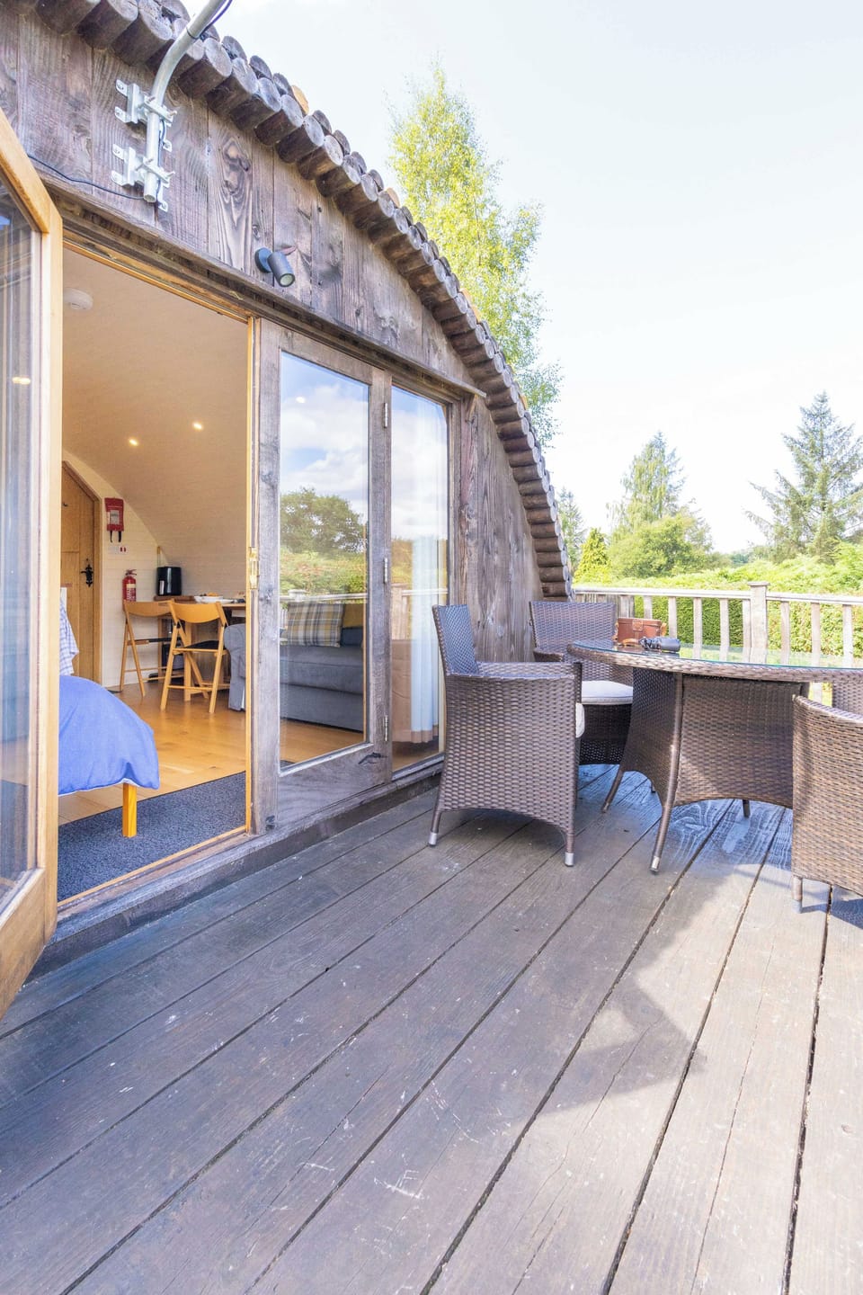 Open the patio doors and let fresh Welsh air flow through the pod, connecting your cosy interior with the private outdoor dining space.