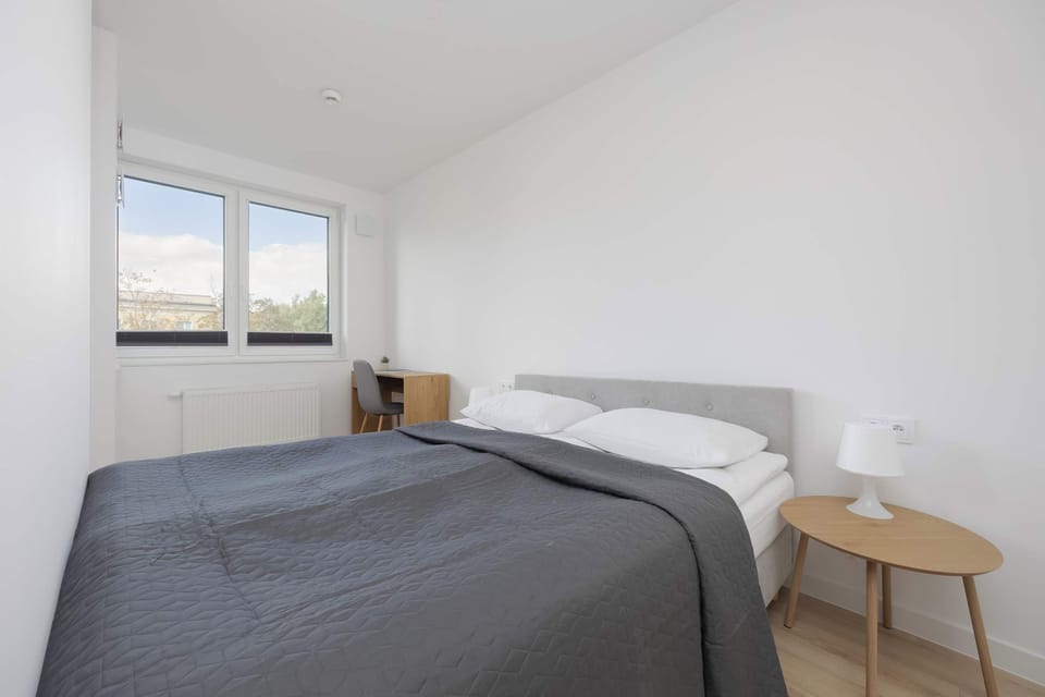 The living area's modern and stylish decor creates a welcoming atmosphere. 