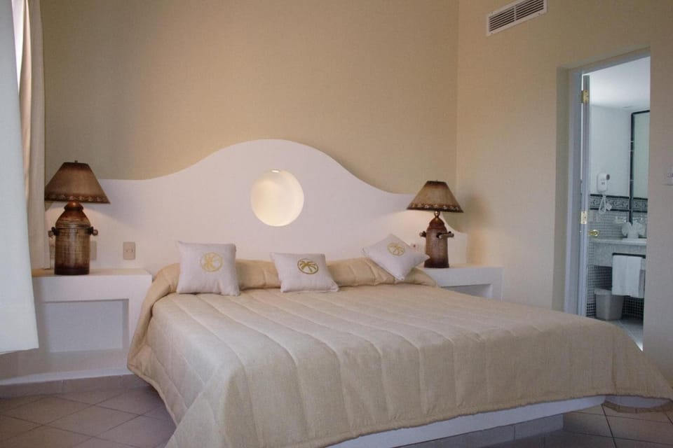 1 bedroom, blackout drapes, iron/ironing board, free cribs/infant beds