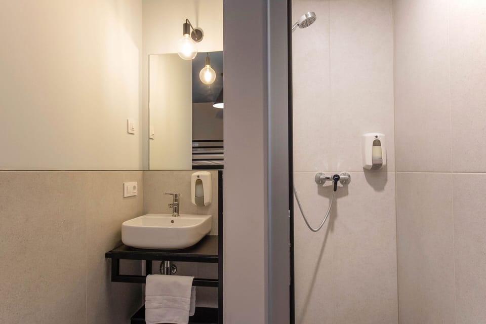 Shower, towels, soap, shampoo