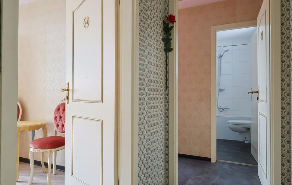 Corridor to multiple rooms