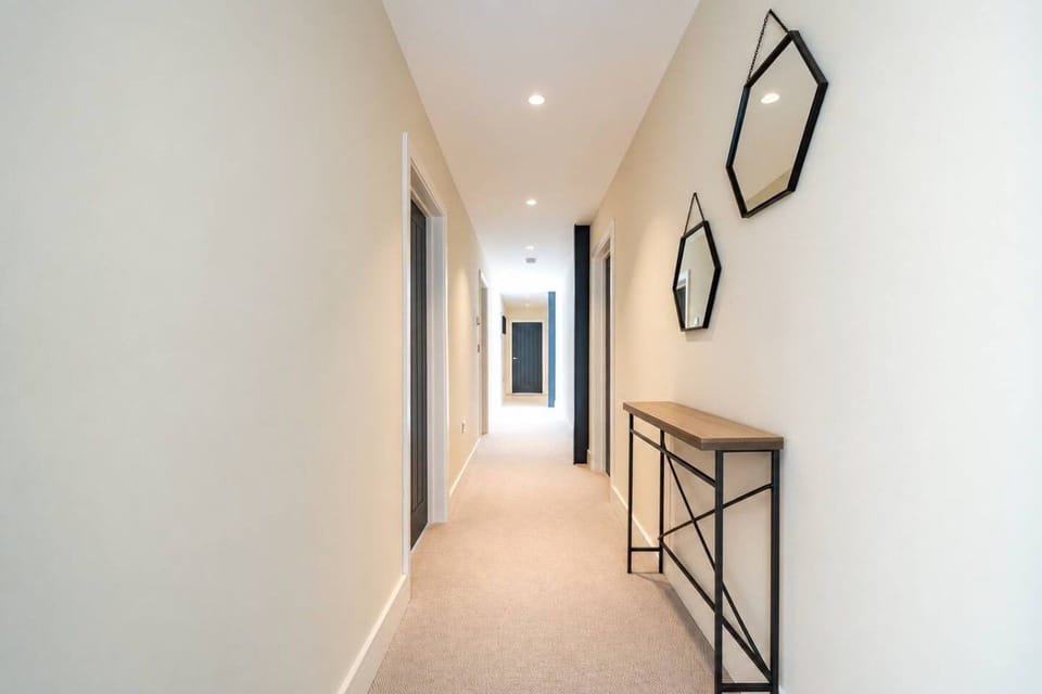 Hallway to bedrooms and bathrooms