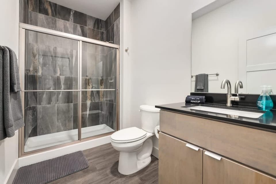 Full bathroom with a glass walk-in shower