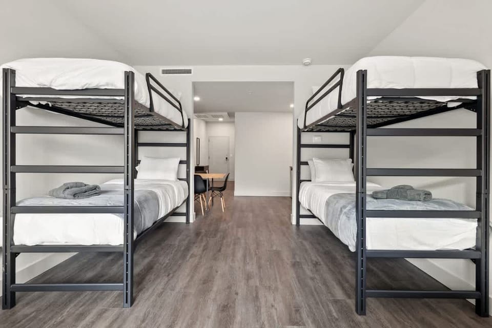 Two sets of twin-over-twin bunk beds