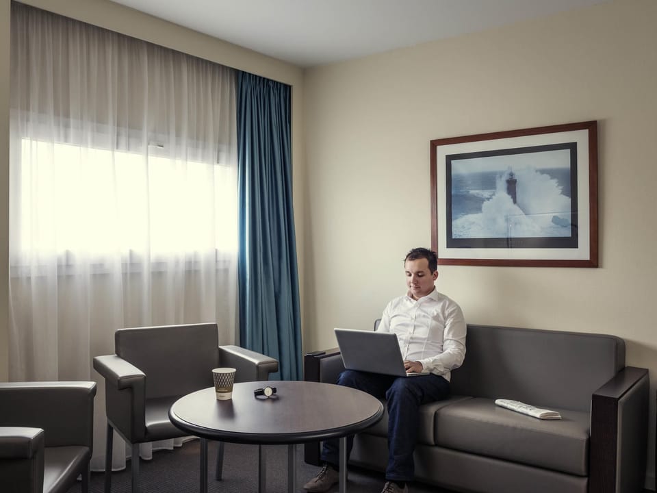 Suite, 1 King Bed | Premium bedding, in-room safe, desk, blackout drapes