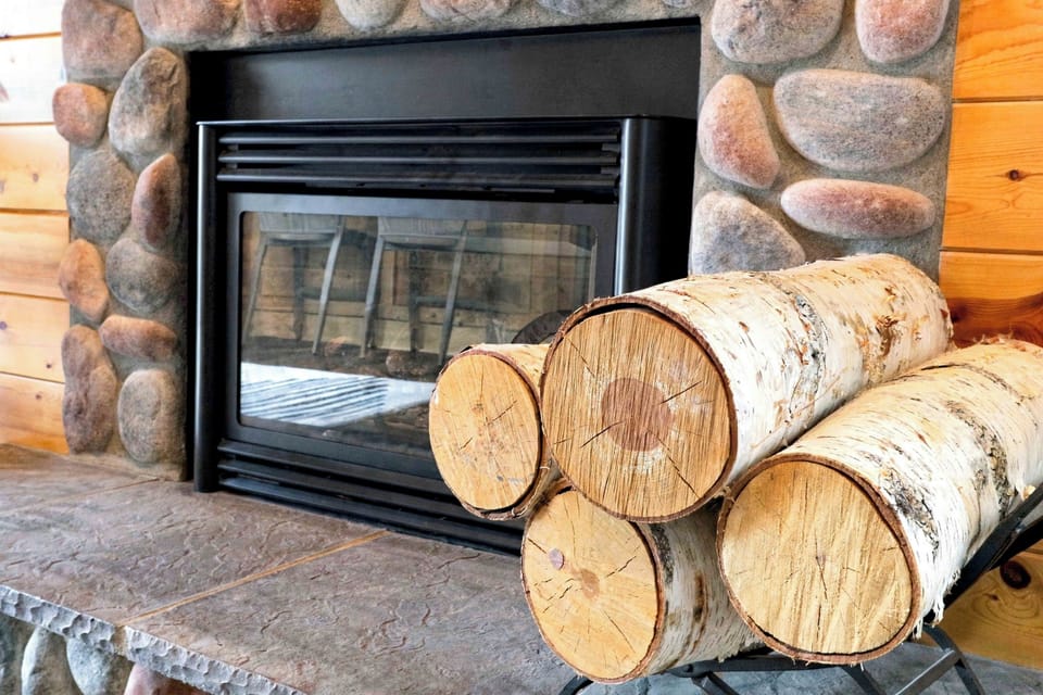 Cozy up on cool evenings by the fireplace with freshly stacked firewood ready to burn.