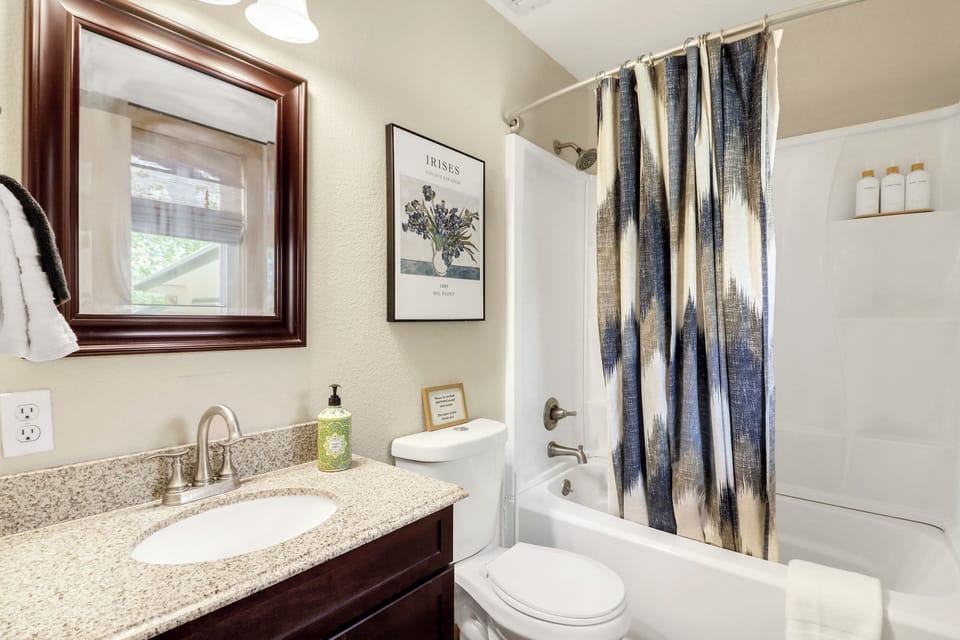 Freshen up in your private bathroom with thoughtful details like granite countertops, a tub-shower combo, and stylish decor touches that make every moment feel special.
