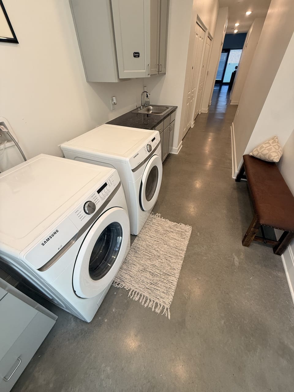 Convenient in-unit laundry with full-size washer, dryer, and folding space